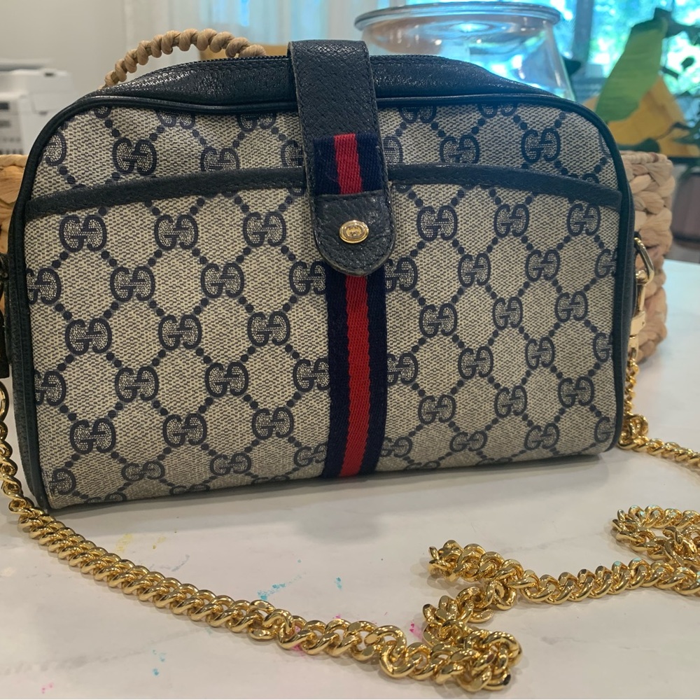Vintage Gucci with removable should strap.